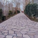 اجرای سنگ لاشه کف دیوار نما ویلا باغچه